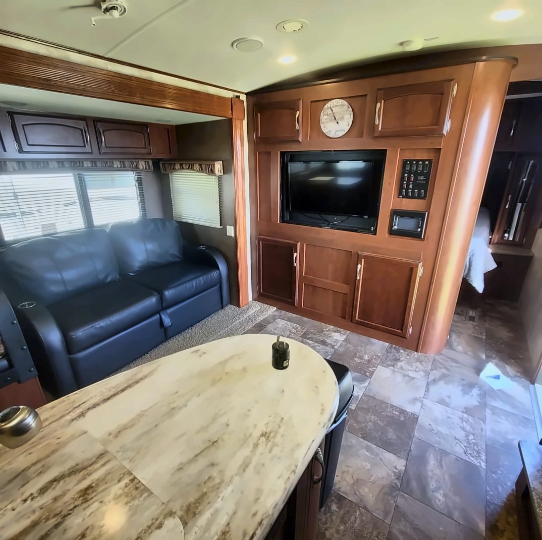 Living area with sofa bed and entertainment center